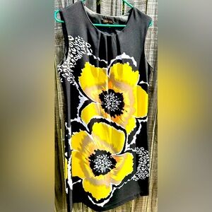 🌟2/$15 Voir Voir black knee length dress with yellow flower design. Size 10